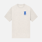 NOOB Spanky Logo embroidered in blue on the font of a heather oatmeal t-shirt.